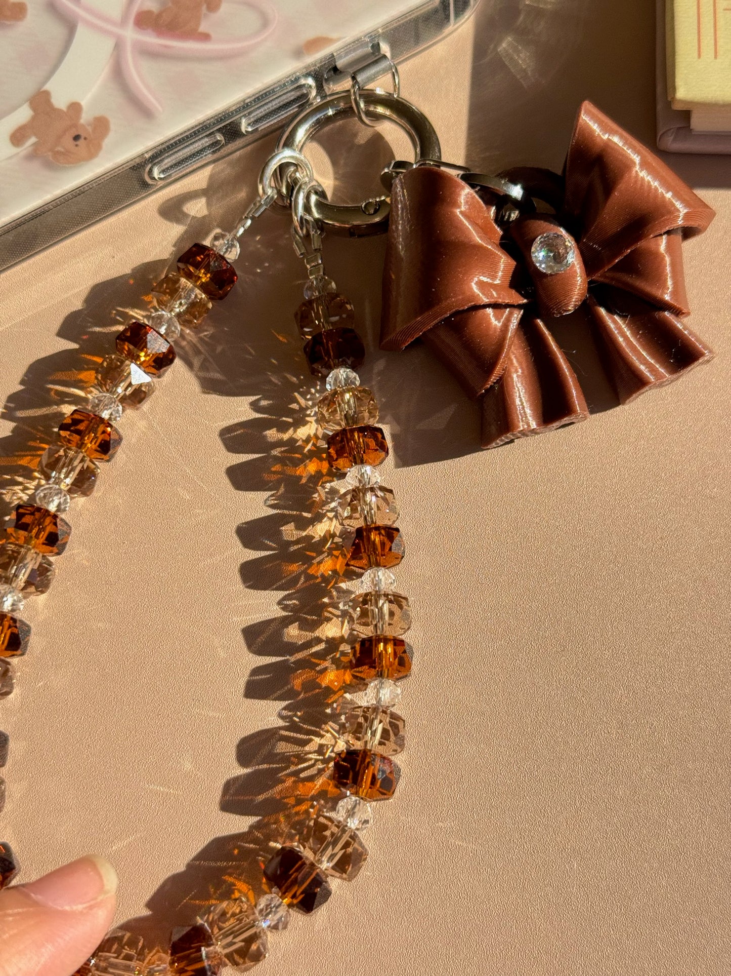 Brown Bow K9 Phone Chain with beaded phone charm and cubic zirconia bow by UNICOLOOM