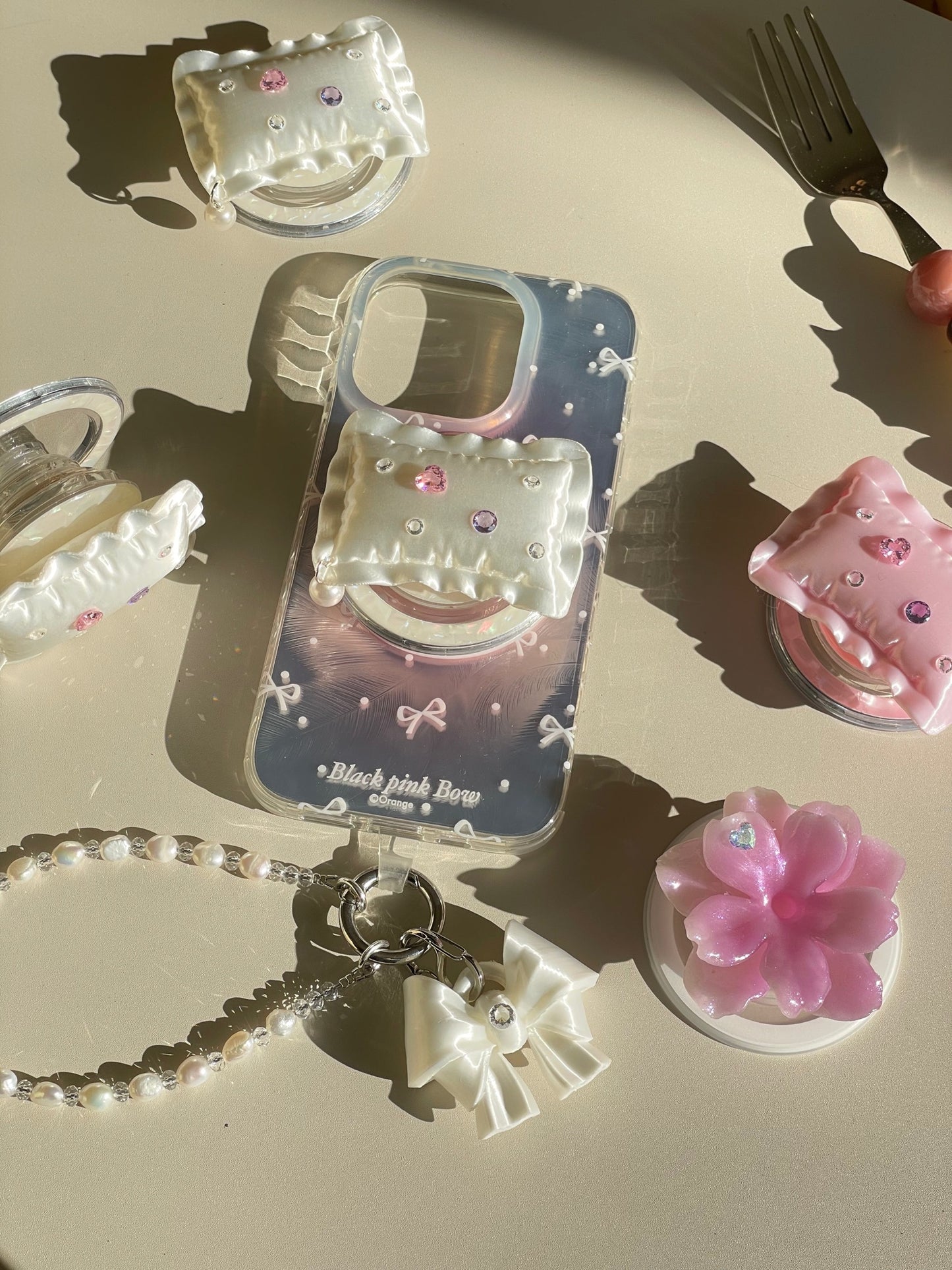 White Bow Pearl Phone Charm with freshwater pearls and cubic zirconia bow by UNICOLOOM