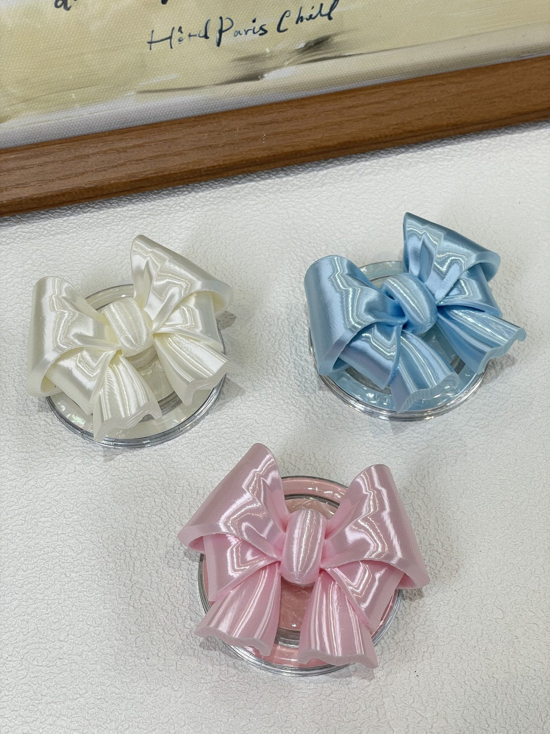 Bow Magnetic Phone Grip in Silk White, Silk Pink, and Silk Blue colors by UNICOLOOM