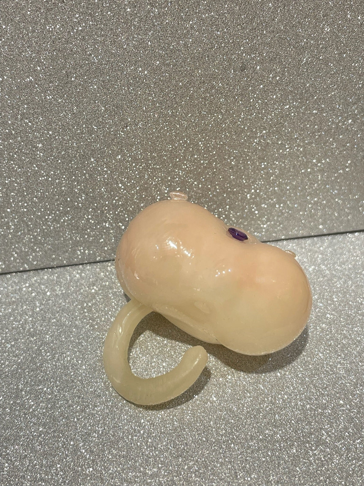 UV Cloud Ring worn on hand, side view