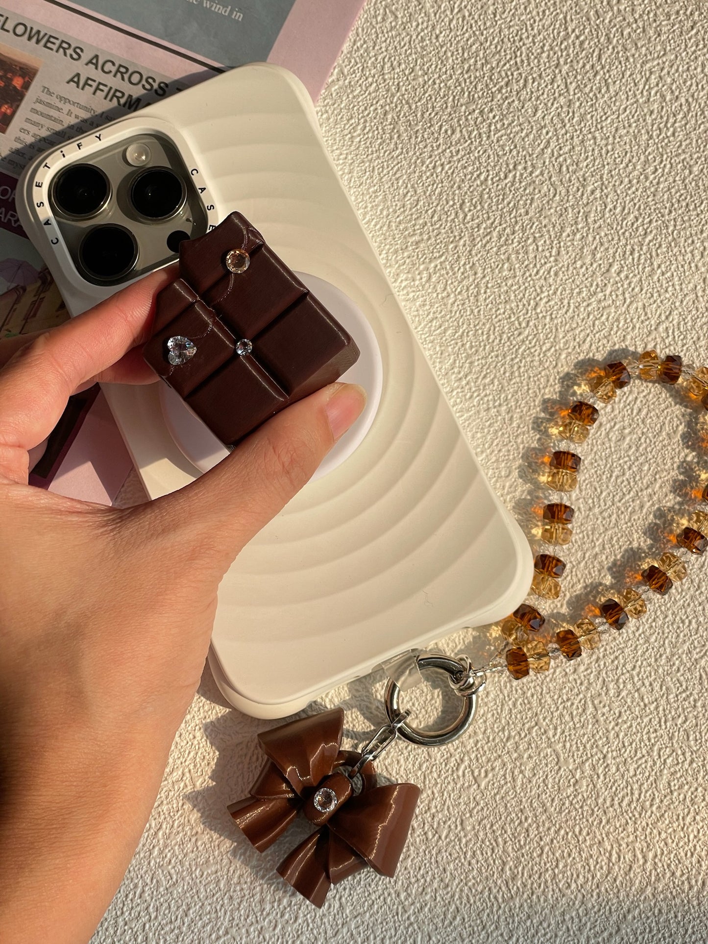 Brown Bow K9 Phone Chain with beaded phone charm and cubic zirconia bow by UNICOLOOM