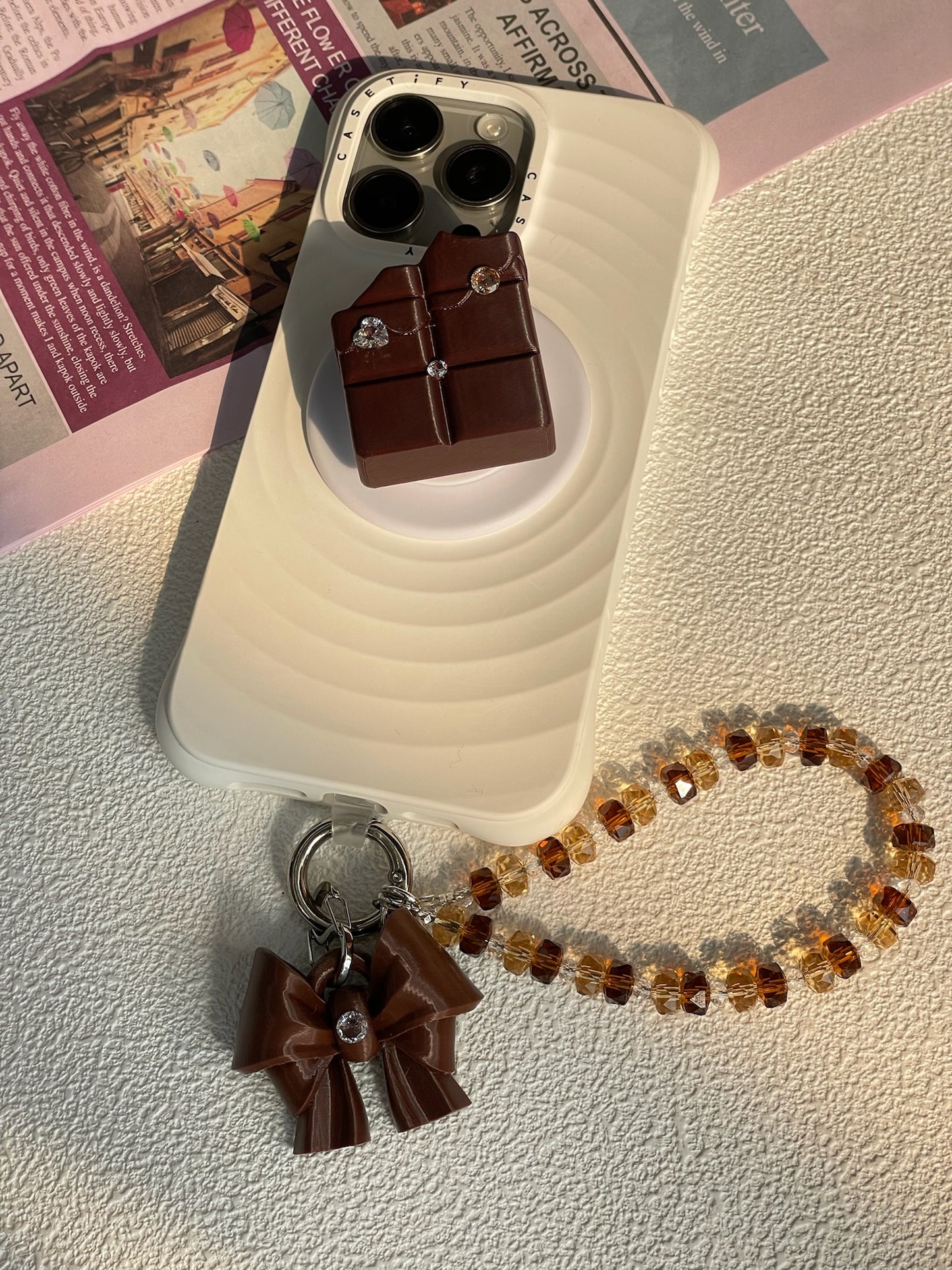 Brown Bow K9 Phone Chain with beaded phone charm and cubic zirconia bow by UNICOLOOM