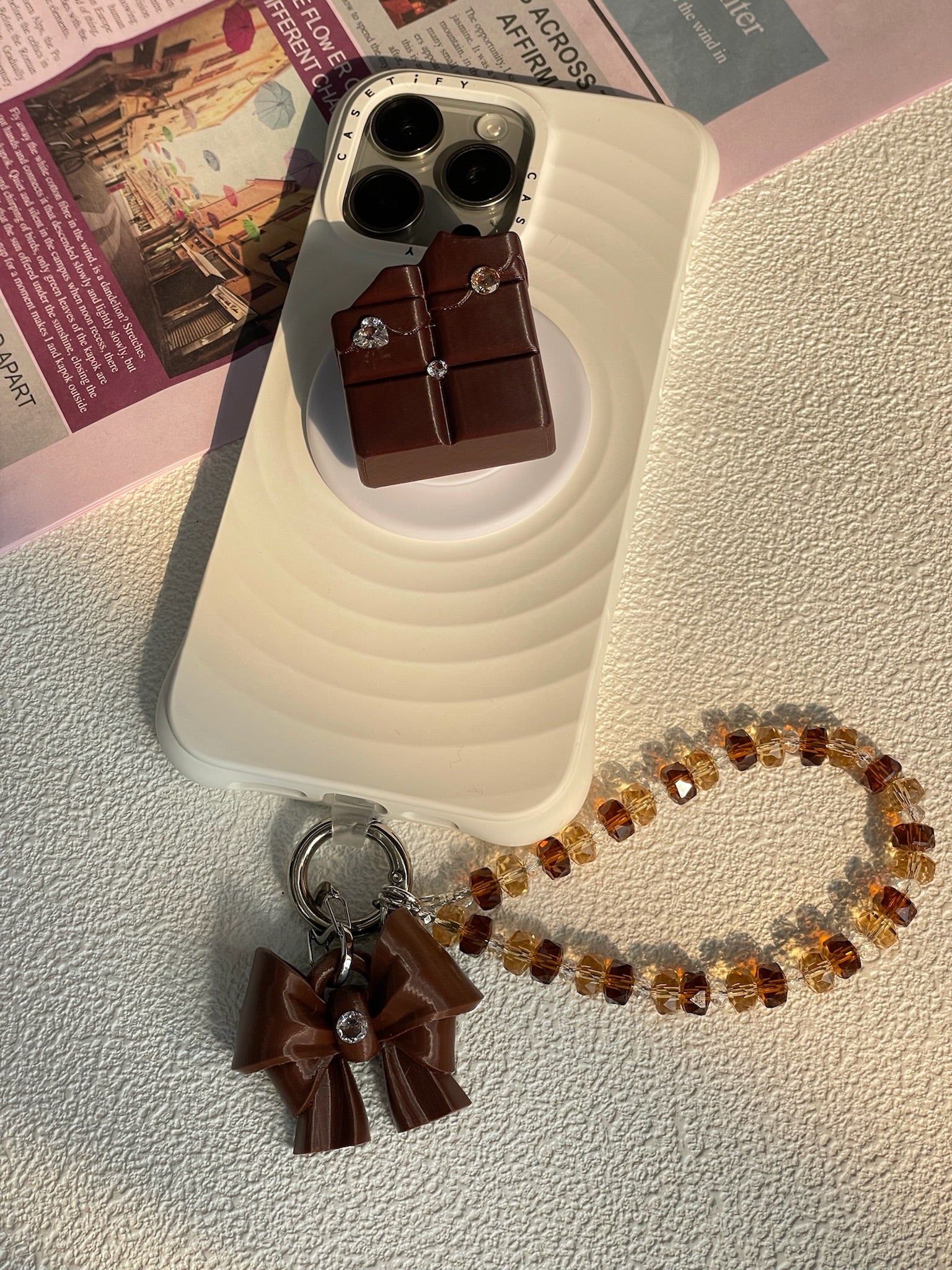 Brown Bow K9 Phone Chain with beaded phone charm and cubic zirconia bow by UNICOLOOM
