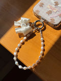 White Bow Pearl Phone Charm with freshwater pearls and cubic zirconia bow by UNICOLOOM