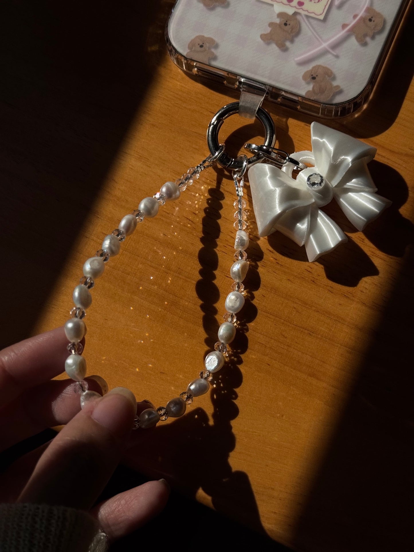 White Bow Pearl Phone Charm with freshwater pearls and cubic zirconia bow by UNICOLOOM