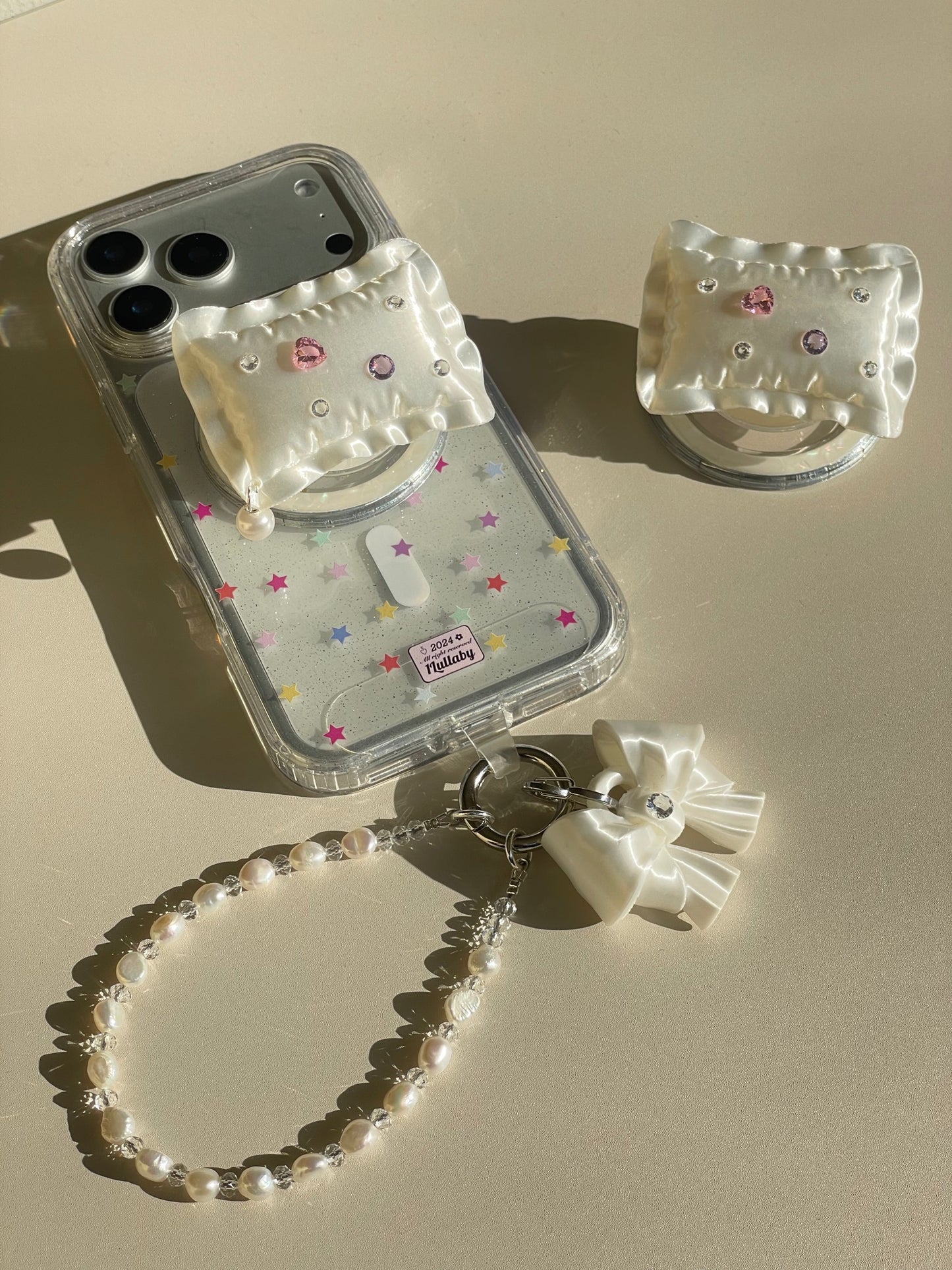 White Bow Pearl Phone Charm with freshwater pearls and cubic zirconia bow by UNICOLOOM