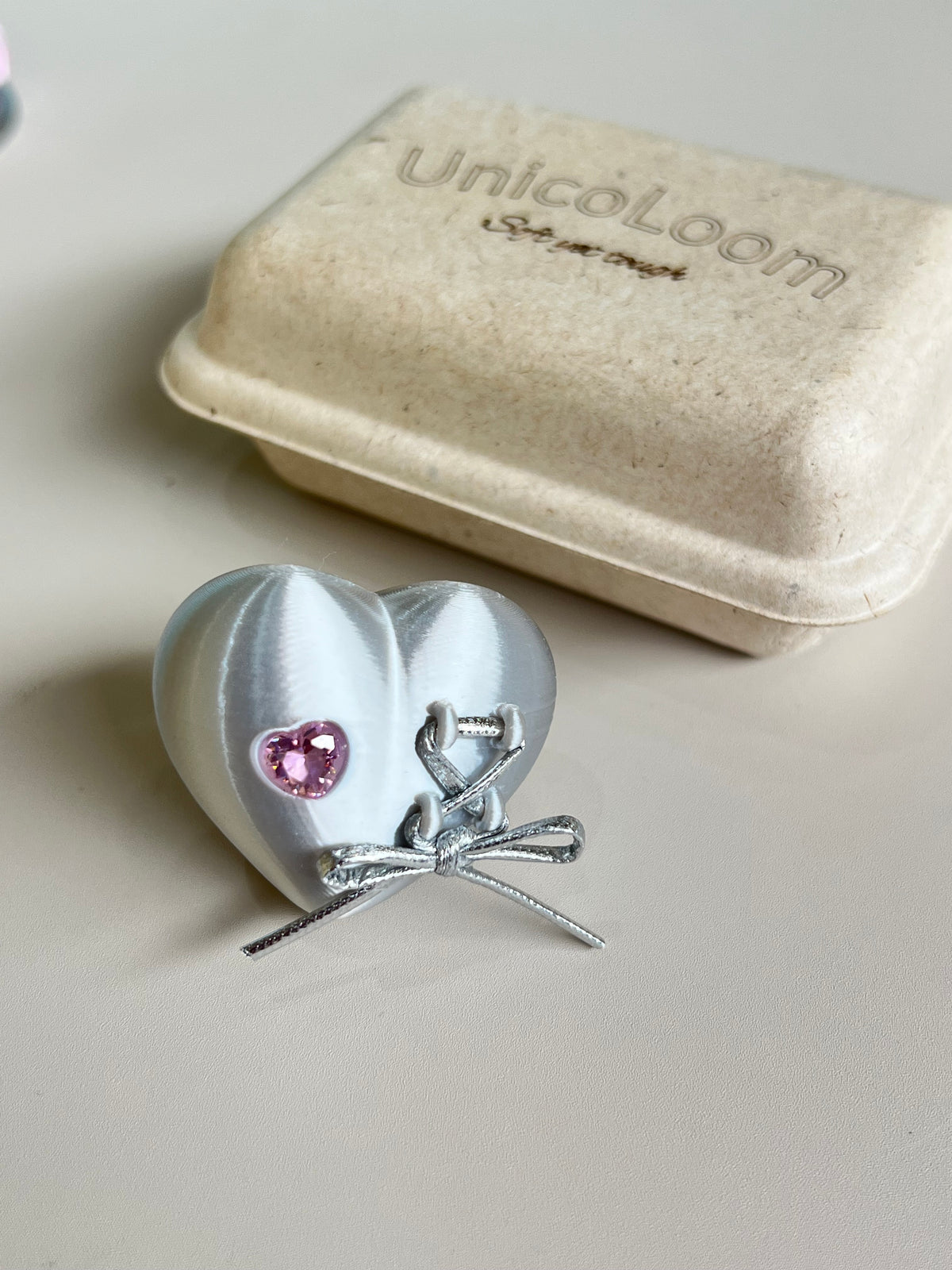 Mechanical Heart Ring worn on hand, front view
