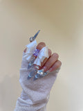Silk White / Purple CZ Ribbon Bow Ring worn on hand by UNICOLOOM