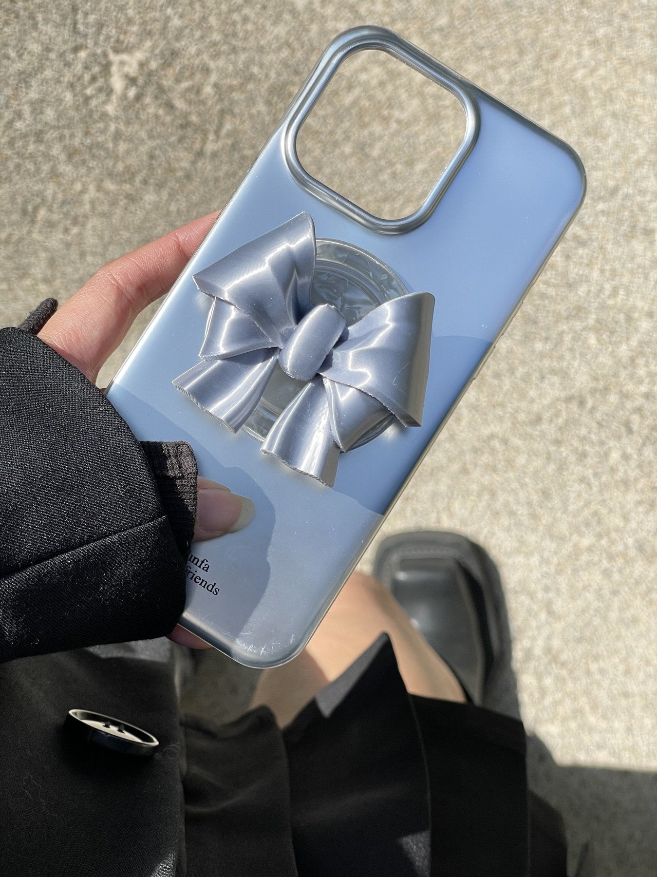 Silk Blue Bow Magnetic Phone Grip handheld lifestyle view by UNICOLOOM