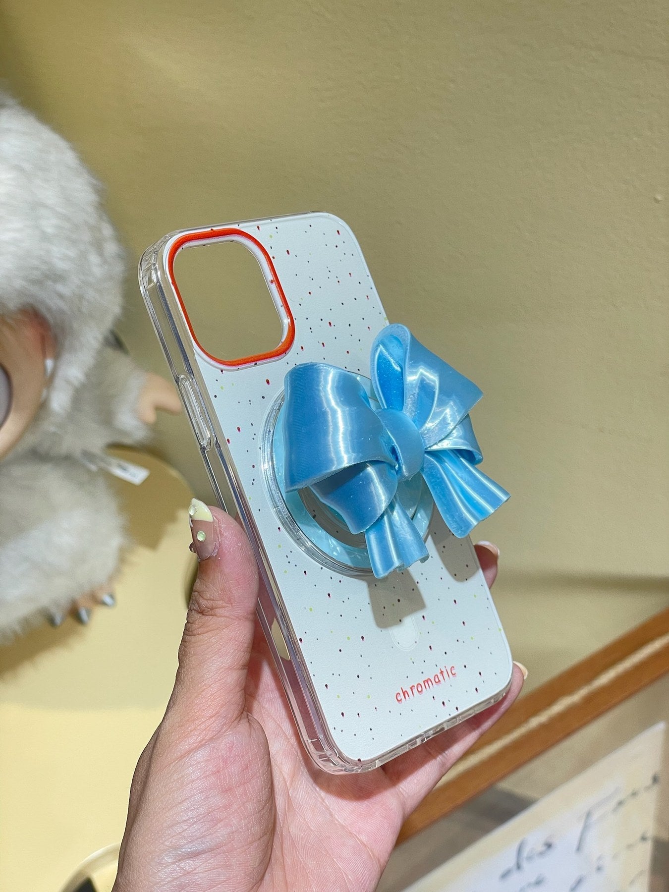 Silk Blue Bow Magnetic Phone Grip on a MagSafe-compatible iPhone case by UNICOLOOM