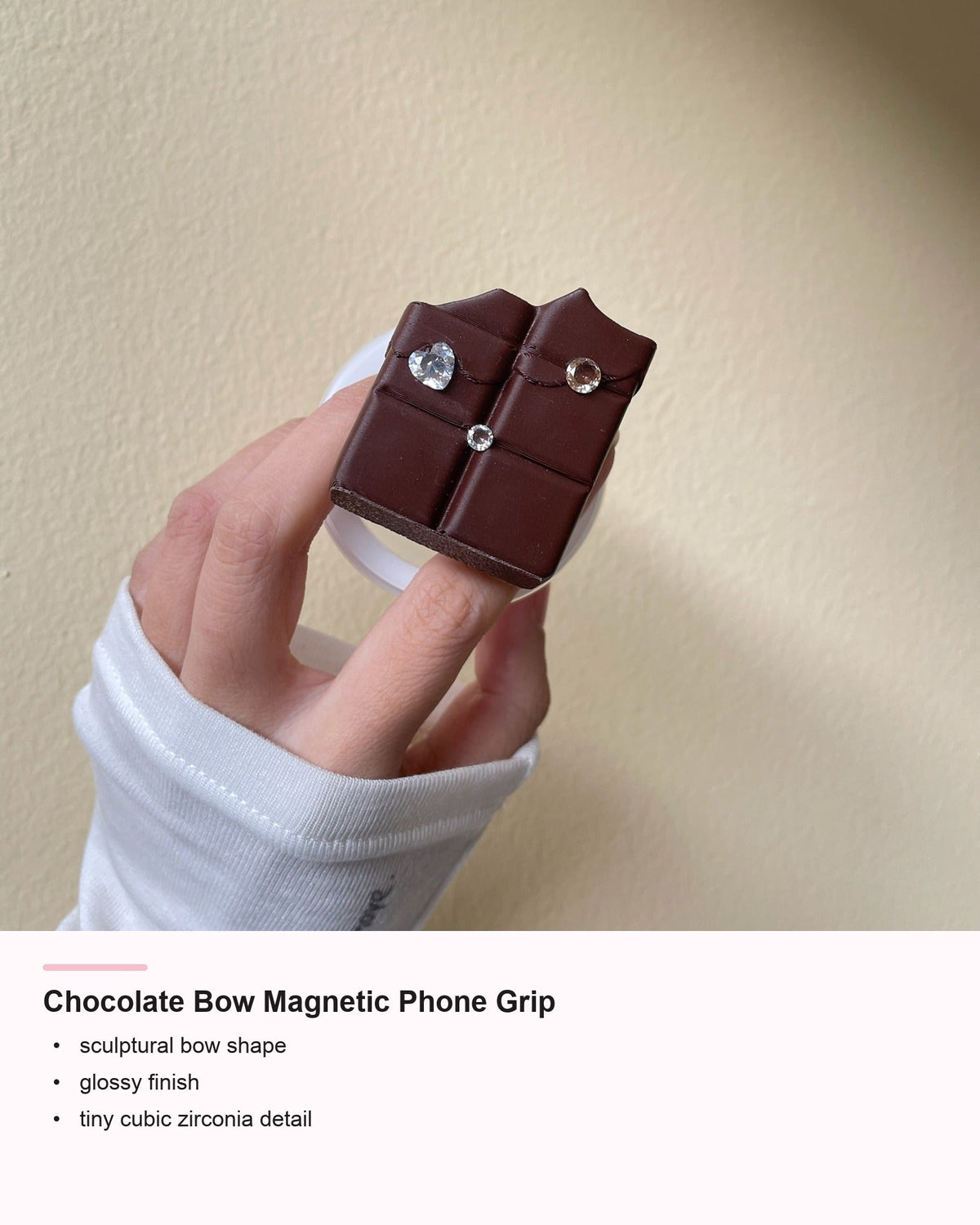 Chocolate Bow Magnetic Phone Grip detail card showing bow shape and cubic zirconia detail