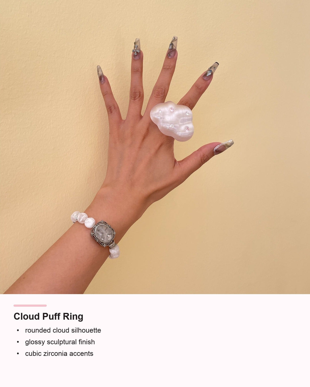 Cloud Puff Ring detail card showing silhouette and cubic zirconia accents
