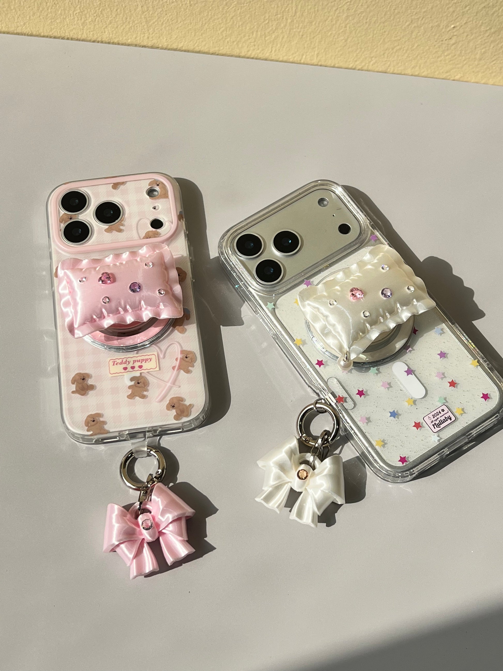 Bow Phone Charm in silk white and silk pink with cubic zirconia by UNICOLOOM
