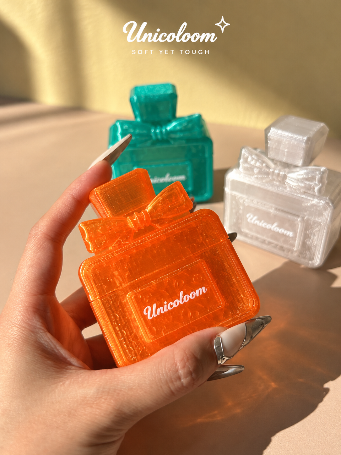 UNICOLOOM perfume bottle AirPods case