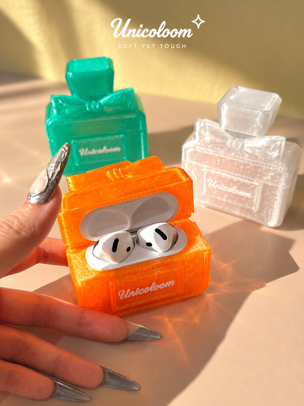 UNICOLOOM perfume bottle AirPods case
