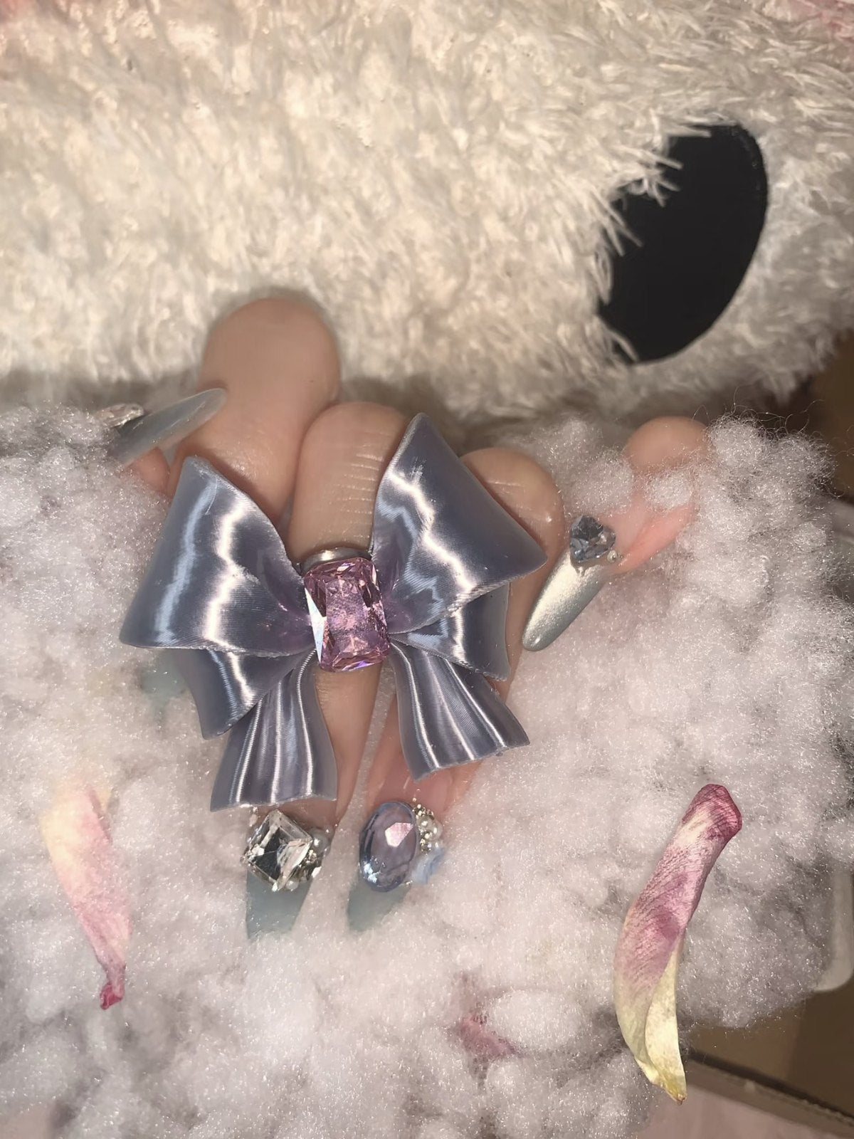 Silk Silver Ribbon Bow Ring with purple crystal worn on hand by UNICOLOOM